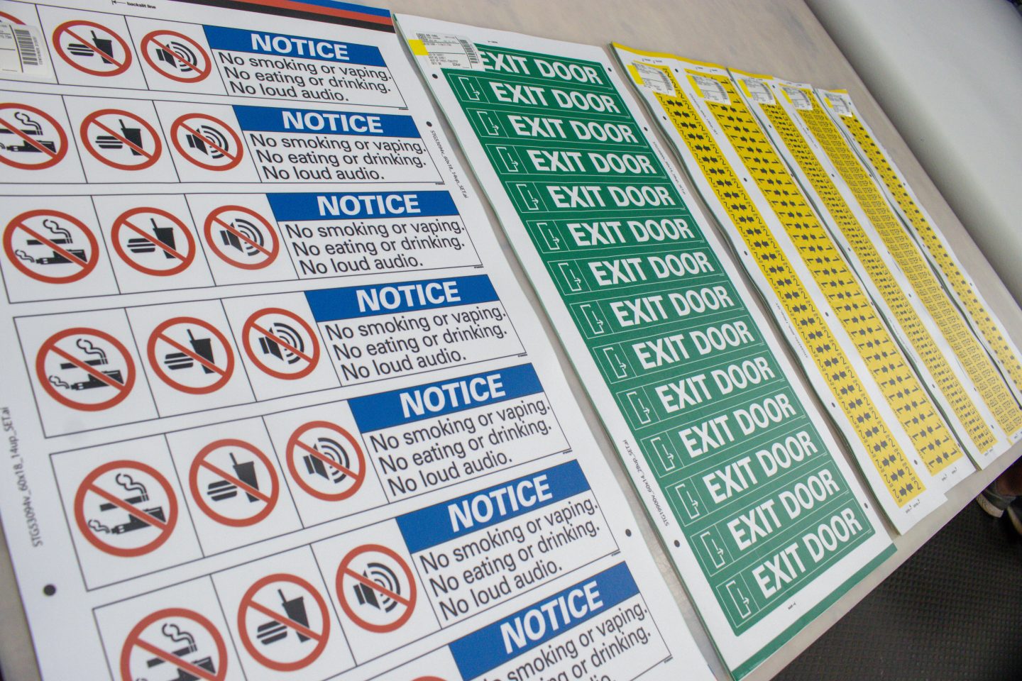Transit decals printed in our shop, designed using the ANSI standard.