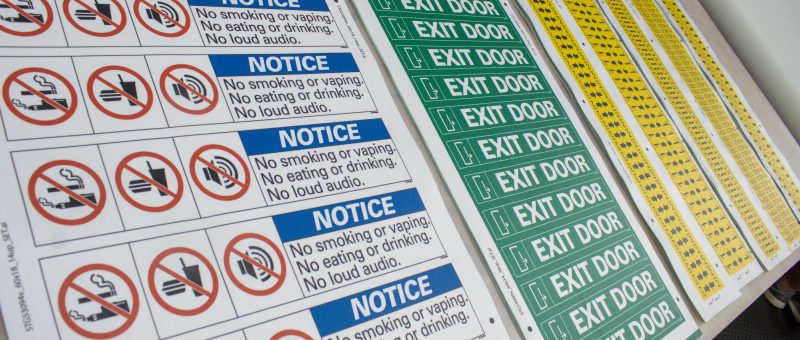 Transit decals printed in our shop, designed using the ANSI standard.